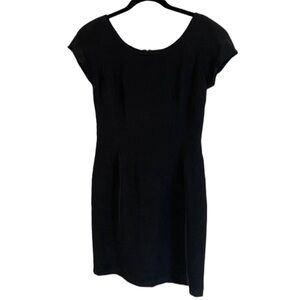 PATRICK Collection. Vintage. 100% black silk dress. Size 4.